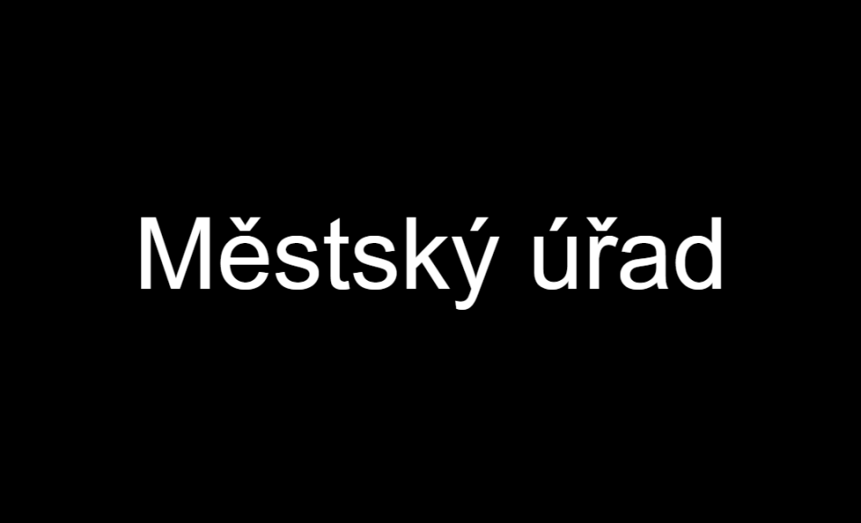 černé pozadí s textem městský úřad
